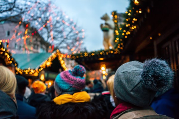 People attending a Christmas market in Cologne